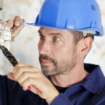 Electrician-in-seattle-focused-on-his-work