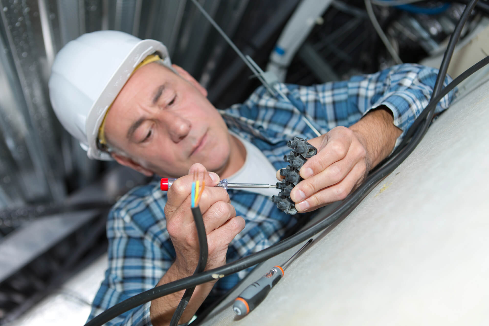 electrician working on Knob and Tube replacement seattle