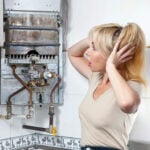 woman-wondering-what's-wrong-with-her-water-heater-in-seattle