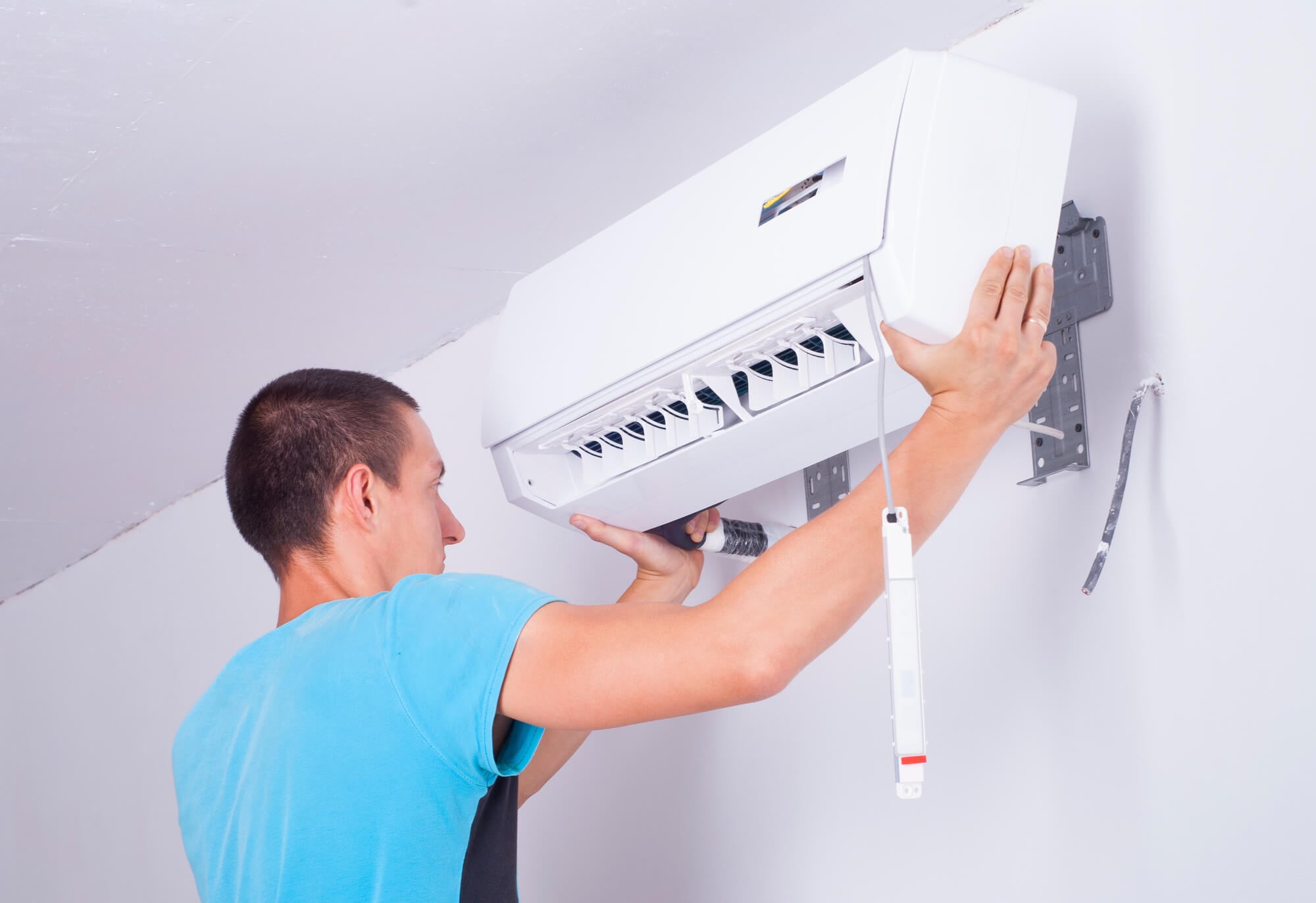 worker during Air Conditioner Installation in Seattle