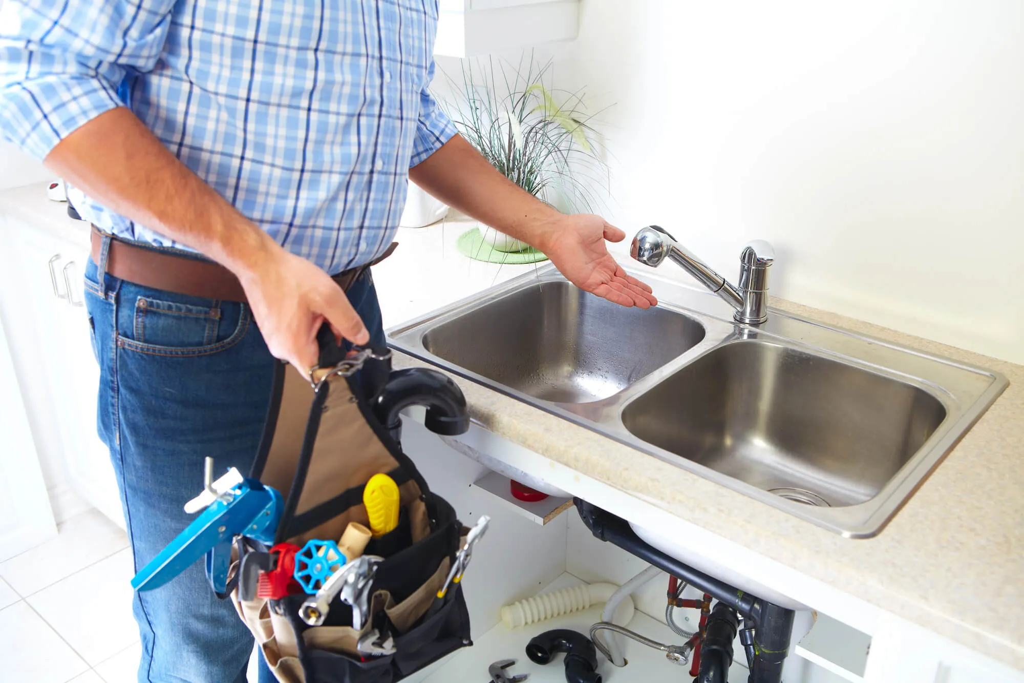 man Fix clogged drain Seattle