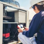 worker doing Furnace Maintenance Seattle